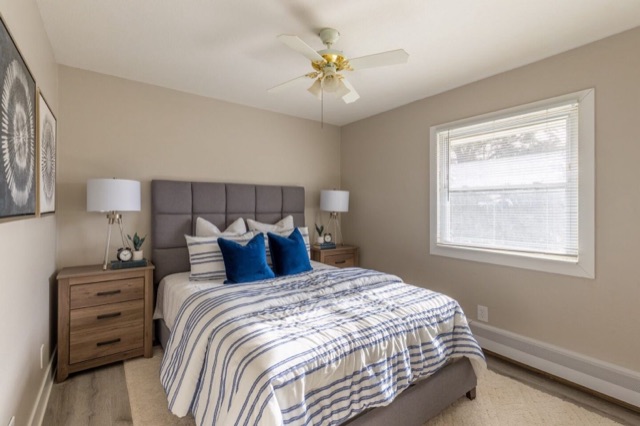 Bedroom with ceiling fan at The Jefferson
